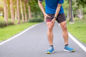 young-adult-male-with-muscle-pain-during-running-runner-have-leg-ache-due-to-iliotibial-band-syndrome-a-itbs-sports-injuries-and-medical-concept-980x653